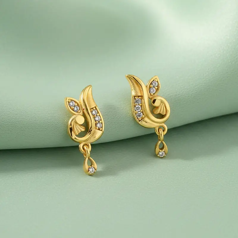 Curved Designer Drop Earrings – Gold-Finished With Subtle Crystal Highlights 1