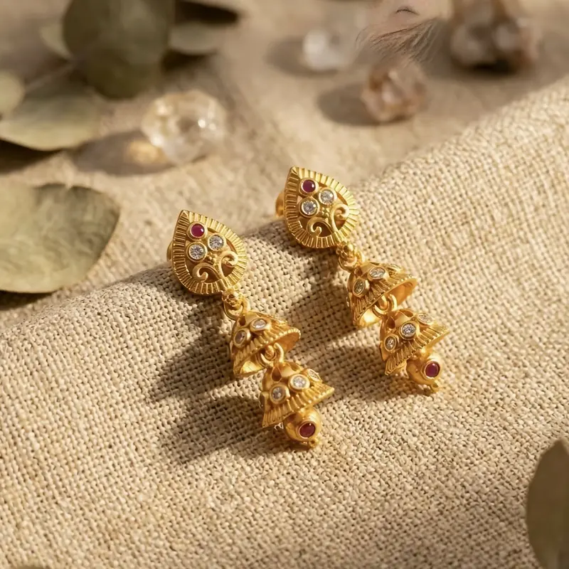 Double-Layer Gold-Plated Jhumka Earrings With Ruby And Stone Embellishments 1