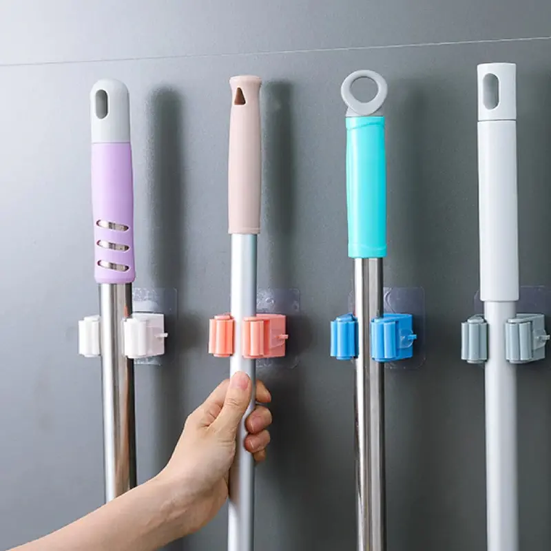 Magic Adhesive Mop & Broom Holder – No-Drill Wall Mount For Cleaning Tools 1