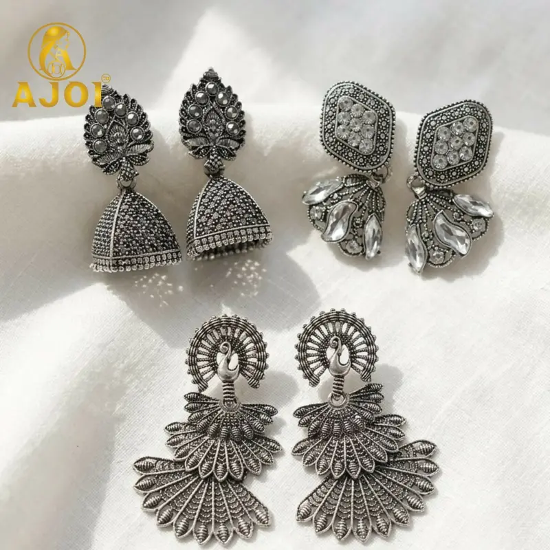 Oxidized Silver Peacock-Inspired Jhumka Earrings – 3-Piece Collection 1