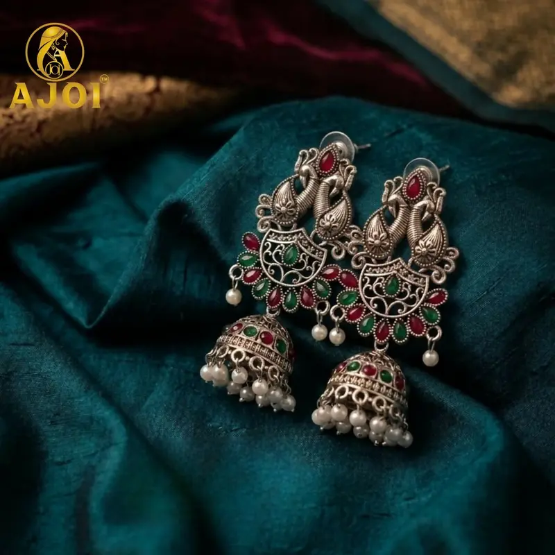 Peacock-Inspired Oxidized Silver Jhumka Earrings With Ruby-Green Gemstones And Pearls 1