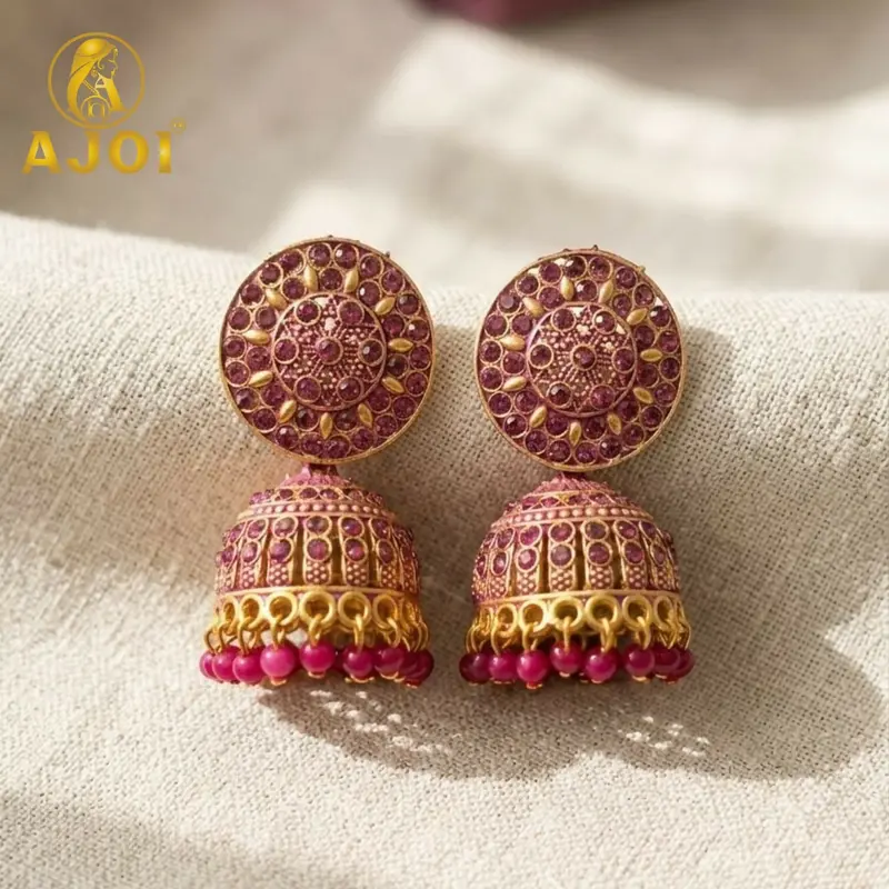 Pink Stone Jhumka Earrings – Antique Gold Finish & Cultural Craftsmanship 1