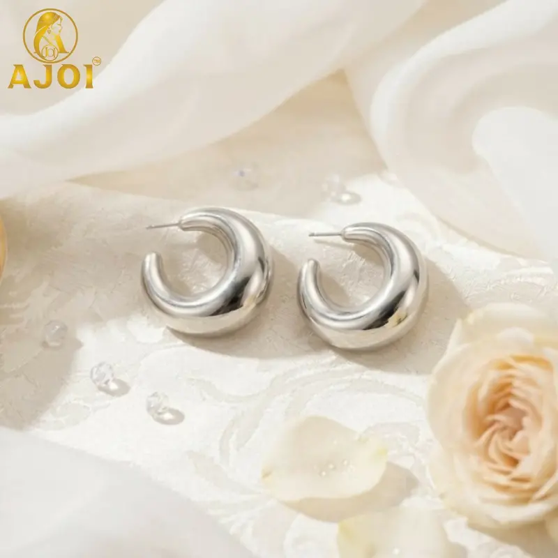 Polished Silver Crescent Hoop Earrings For Effortless Timeless Style 1