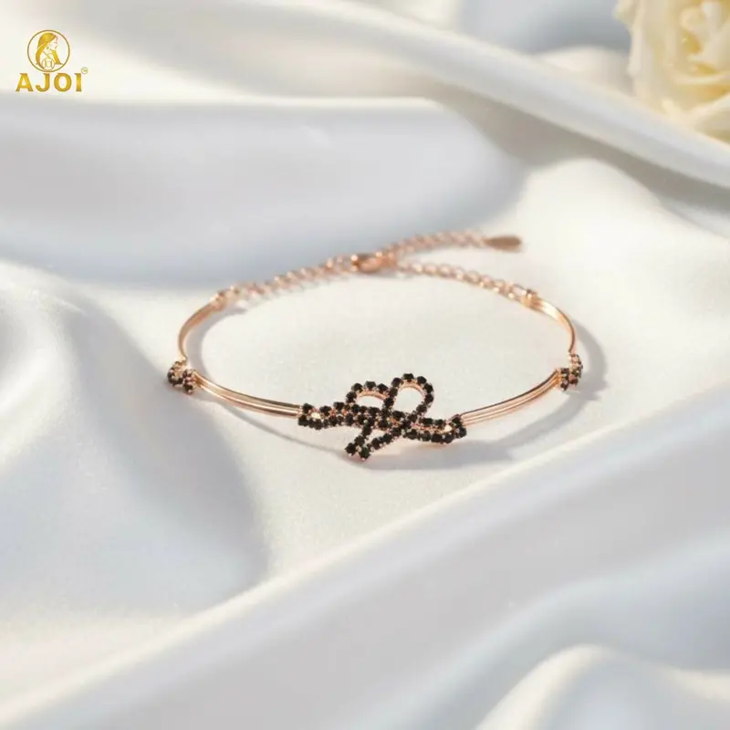 Rose Gold Bow Charm Bracelet With Adjustable Fit 1