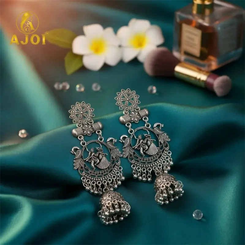 Temple-Style Radha-Krishna Engraved Jhumkas In Oxidized Silver With Ghungroo Details 1